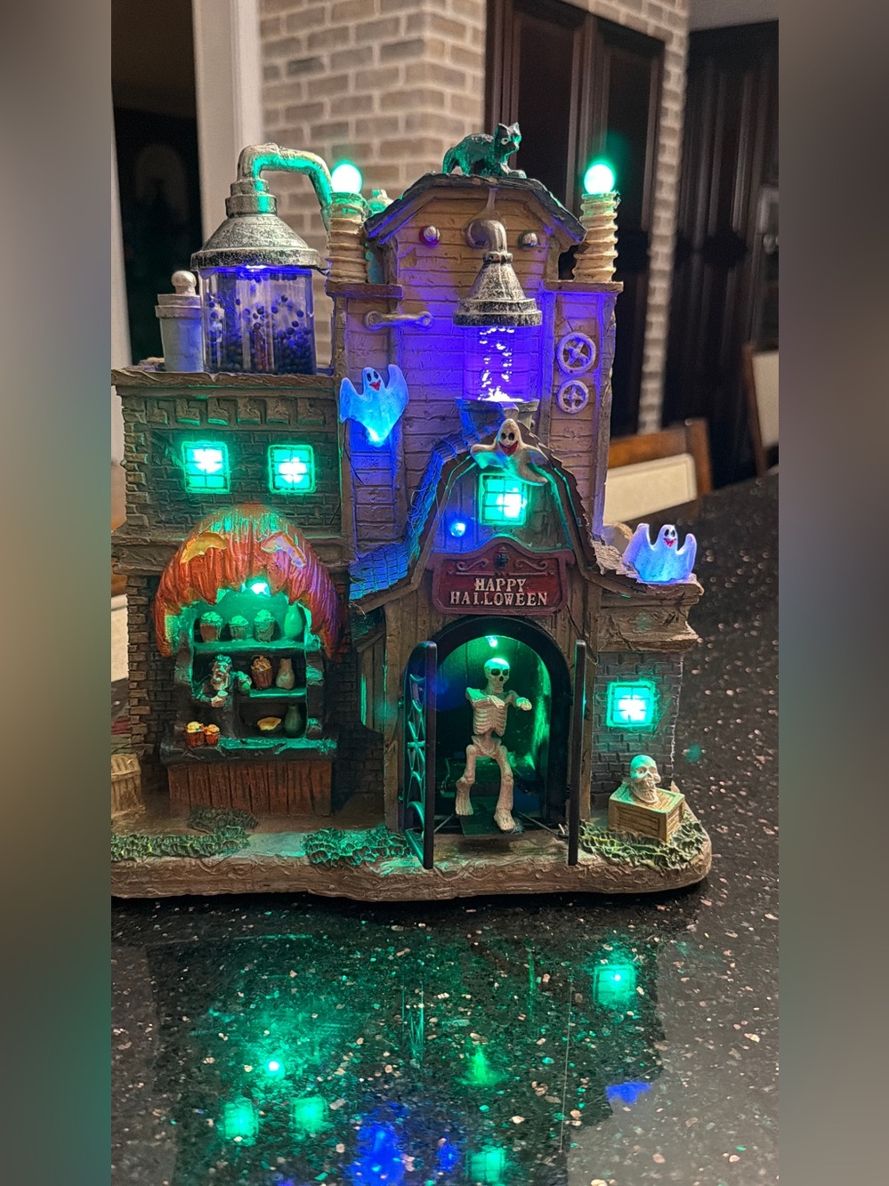 Glitzhome Animated Lighted Halloween Haunted House 11” Skeleton Village Decor